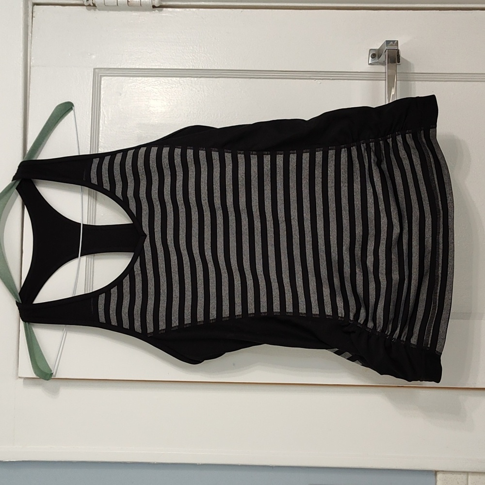 Ideology racerback tank with side rouching and bra top lining